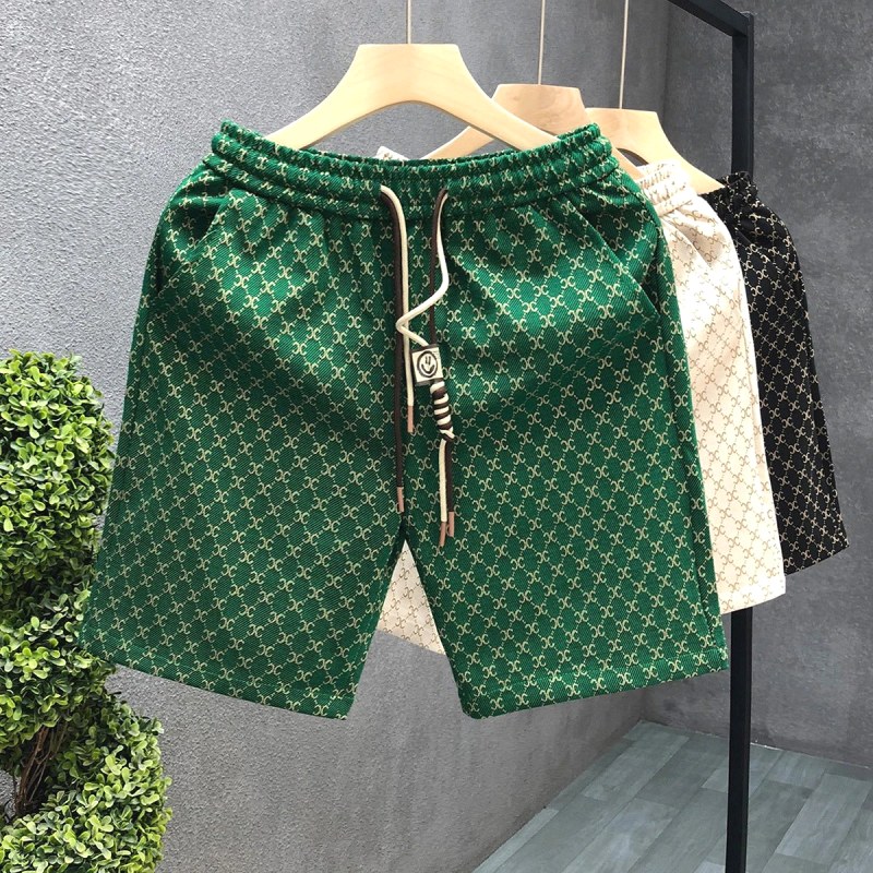Celine Allover-Print Grüne Shorts: Taschenlast bei einem tief sitzenden Kordelzug-Bund für 5,22 $